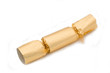 Gold Christmas cracker isolated on white