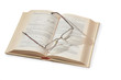 glasses on opening textbook