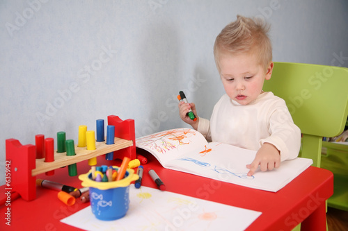Photo: little boy drawing little boy drawing