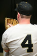 Ball Player Opening Locker After Game