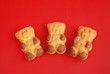 Sweet cookies close up on red background