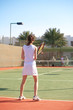 Young women playing tennis in the sun Young women playing tennis in the sun
