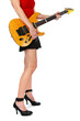 Girl with guitar showing legs isolated on white
