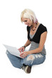 Beautiful blond girl on her laptop computer isolated on white