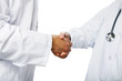 Photo: healthcare and medicine: doctors shaking hands healthcare and medicine: doctors shaking hands