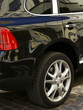 Photo: black car wheel and brake light black car wheel and brake light