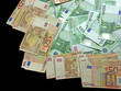 Image : billets sur fond noir