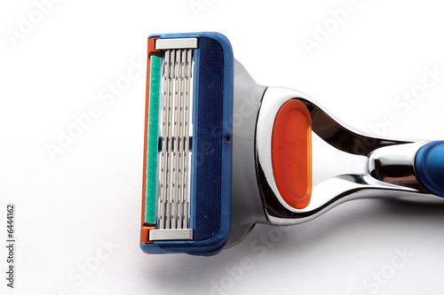 Photo: Sharp razor on white background Sharp razor on white background
