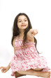 Young girl posing on a white background.