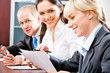 Portrait of smiling businesswomen working with documents Portrait of smiling businesswomen working with documents