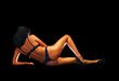 woman in underclothes isolated on black background woman in underclothes isolated on black background
