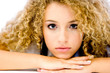 An attractive young woman with great curly hair 