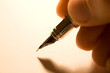 pen with blank paper. color from tungsten lamp
