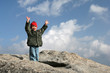 Young kid on top of the mountain Young kid on top of the mountain