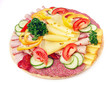 Cold food - salami and fresh vegetables served on plate