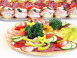Cold food - salami and fresh vegetables served on plate