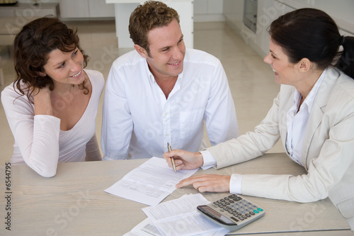 Couple talking to a financial advisor