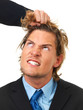  Angry businessman being pulled by the hair, conceptual shoot