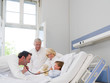 Doctors with a patient Doctors with a patient