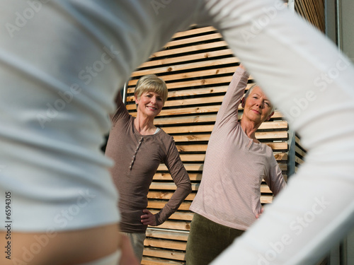 Senior women exercising