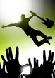 Music star jumping with the guitar in a concert