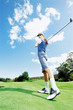 Image : Woman playing golf