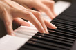 Woman's Fingers on Digital Piano Keys Woman's Fingers on Digital Piano Keys