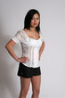 Asian woman with hands on hips