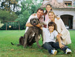 Family and dog in the garden
