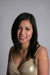 Asian woman smiling at the camera