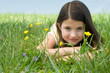 Girl lying on meadow