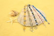 Jewelry & Seashells in Sand