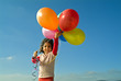 girl and baloons
