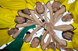 Images : Football team putting hands together