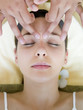 Young woman having a head massage