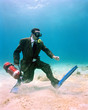 scuba diving businessman underwater