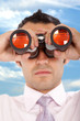 business man searching with binoculars