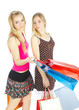 Two girls with bags - comparison shopping. Sale!