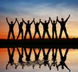 silhouette friends. sunset water