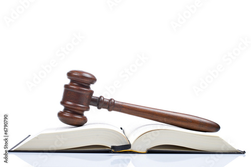 Wooden gavel and law book