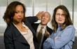 Businesswomen Push back a Businessman