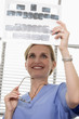 View of a doctor checking xrays.