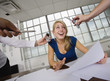 A  business woman overloaded with work.