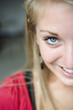 Portrait of a woman smiling.