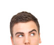 Businessman looking up at corner