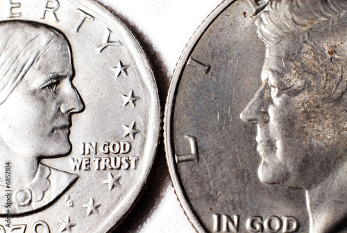 Photo: Two dollar coins facing each other. Two dollar coins facing each other.