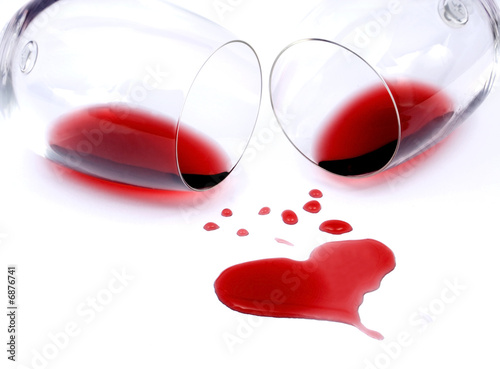Red wine spilled from glasses Red wine spilled from glasses