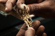 Goldsmith and earring.