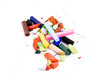 Damaged and new pastels on white background