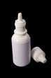 Artificial tears bottle on black background